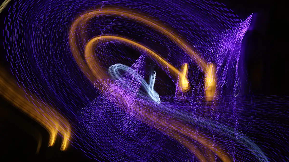 Abstract purple and gold light trails symbolising patience and the uncertain path of reconciliation